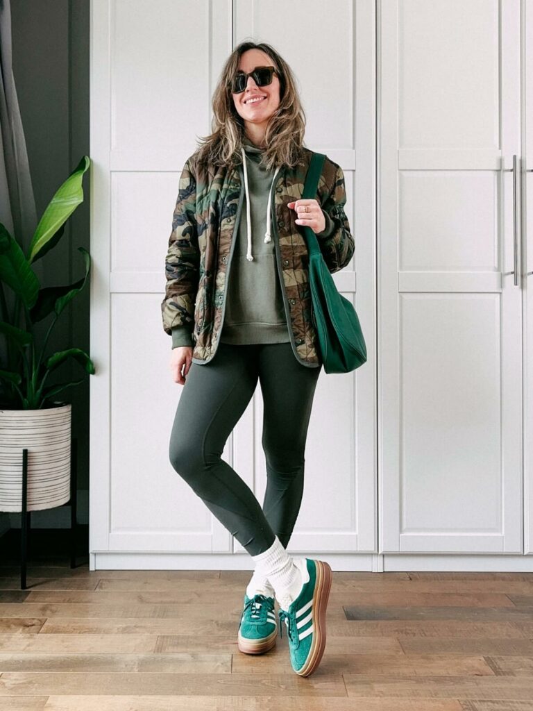 Green tone on tone athleisure outfit with leggings for Spring.